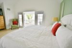 The Master Suite Features a Large Flat Screen Television  Florida Keys Vacation Rental